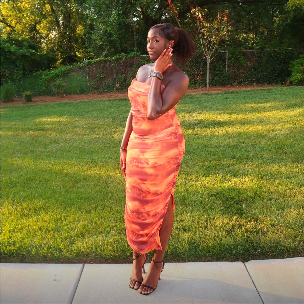 Orange dress with ruched side
